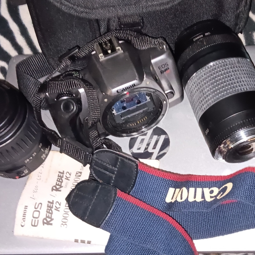Canon EOS Rebel K2 35mm SLR film camera with a Canon EF 75-300mm lens